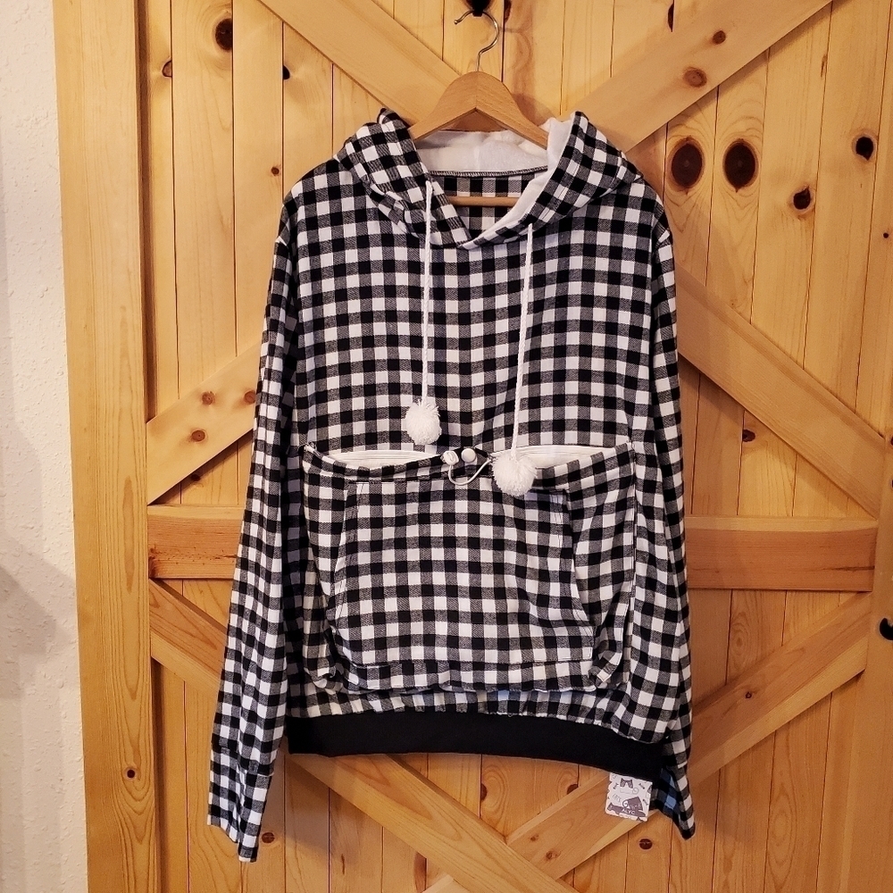 THIS hoodie was designed to carry your pet in the front in kangaroo pouch 2X